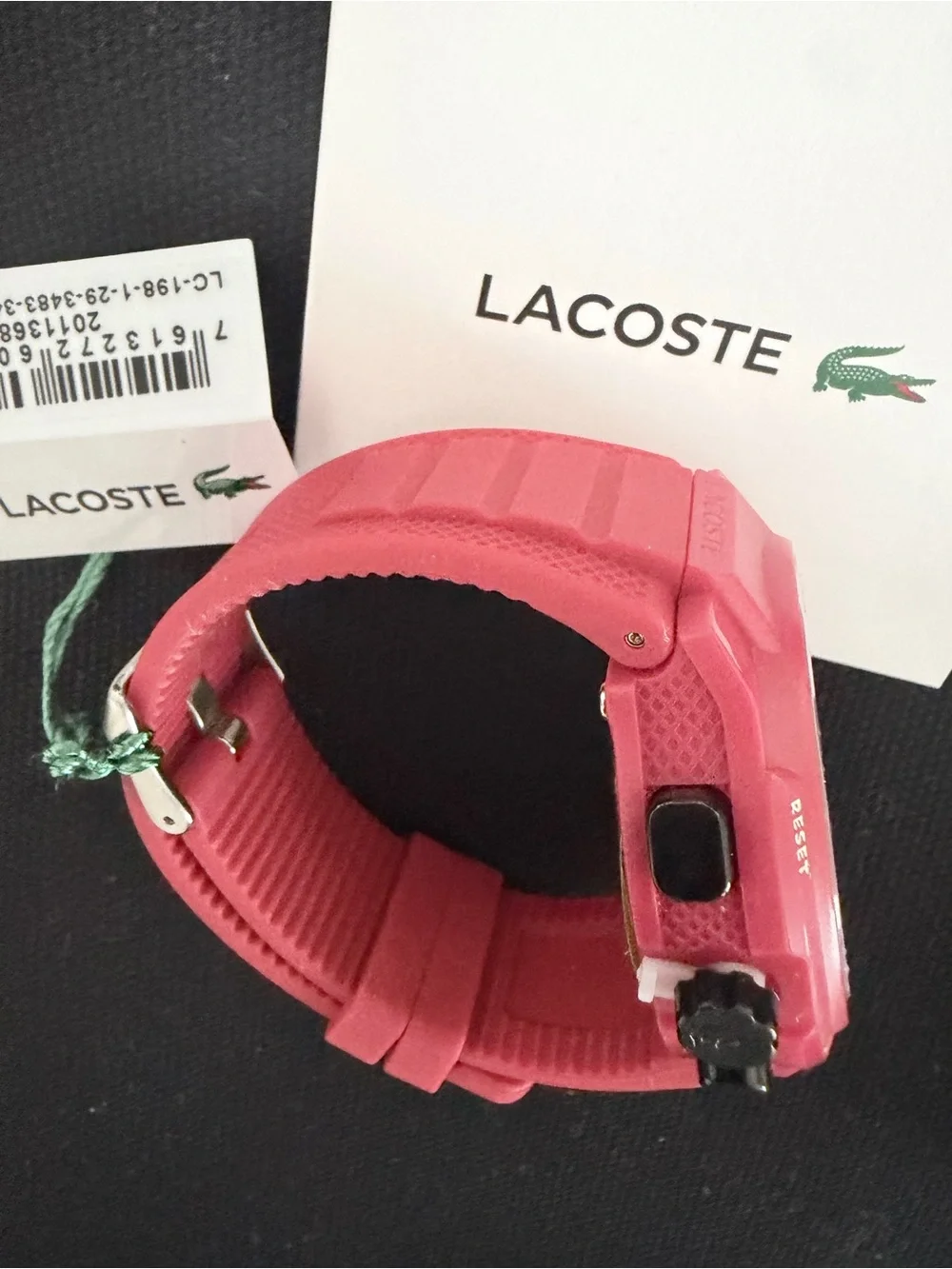 Brand new Lacoste Unisex Analog & Digital Watch in red with black dial.